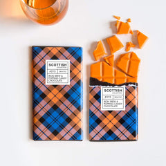 Iron Brew Chocolate Bar, 100g with popping candy and plaid packaging, hand-wrapped in a tactile glassine.