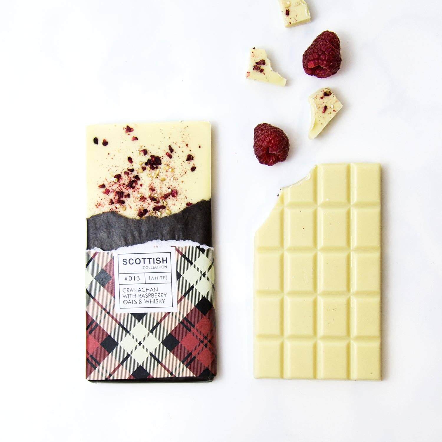 Cranachan Chocolate Bar, 100g featuring creamy white chocolate, oats, and freeze-dried raspberry on a tartan wrapper.