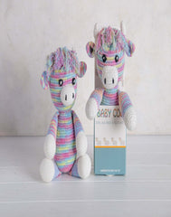 Baby Coo - Crocheted Colourful Highland Cow Toy in Box displayed in vibrant colors with gift packaging.